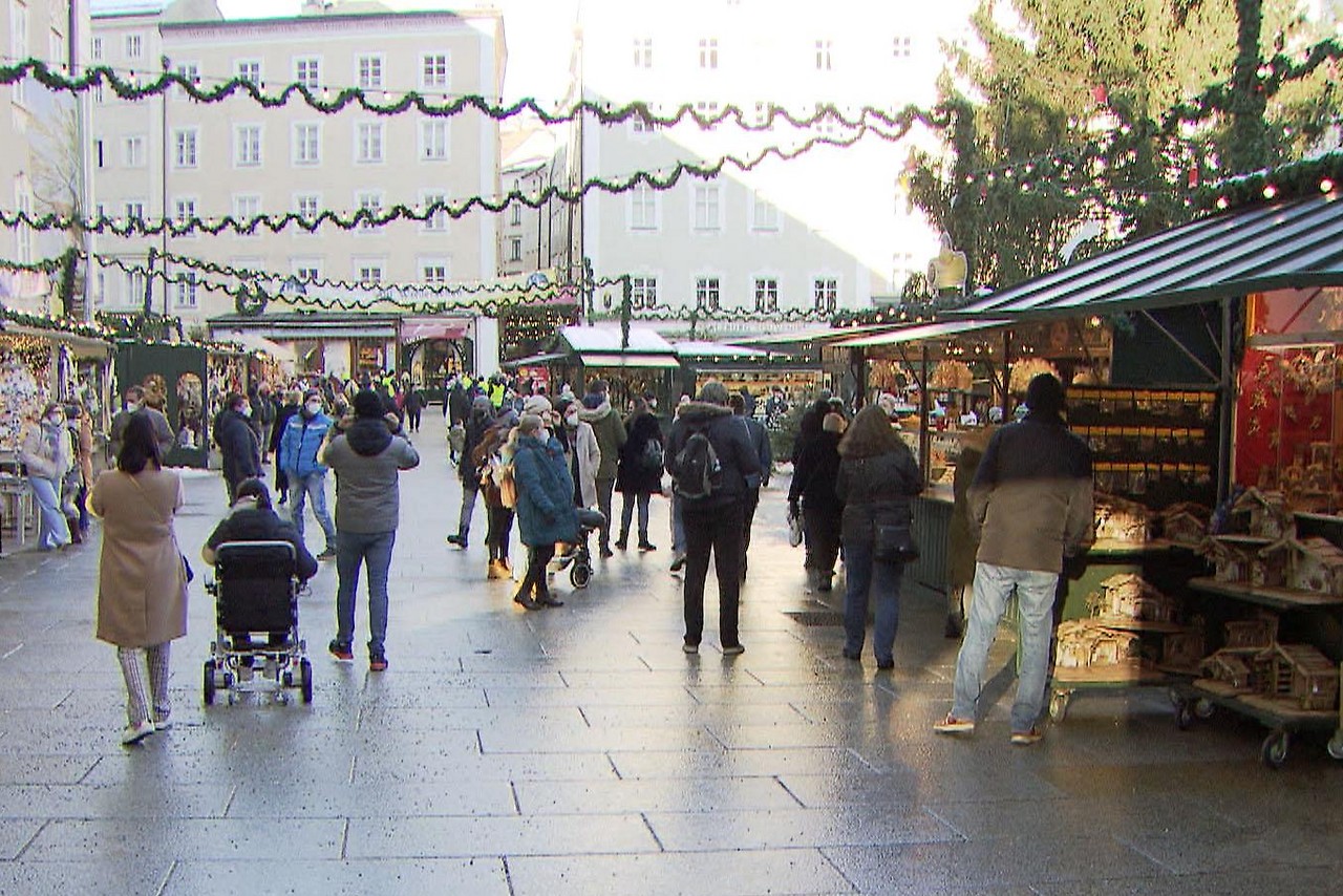 Visitors to the Christmas market in Salzburg's old town